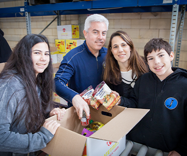 Photo of a happy family. Links to Closely Held Business Stock